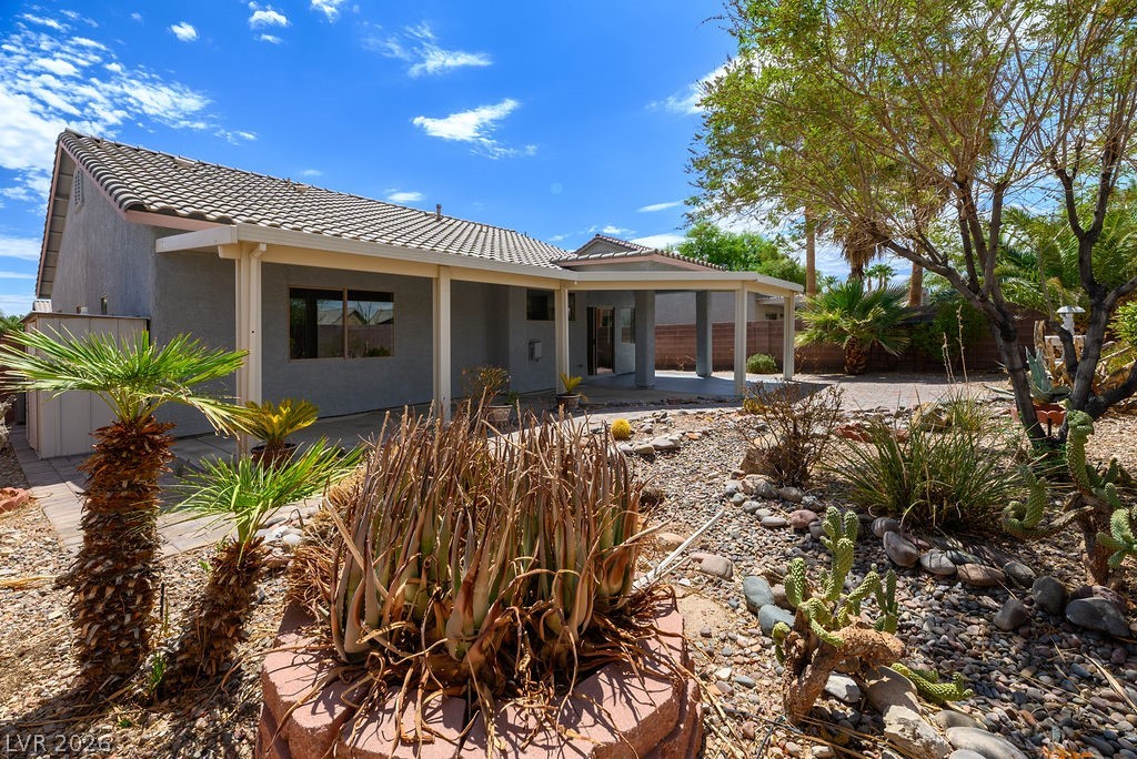 3591 Driving Range Street Las Vegas, NV 89122 - Photo 31 of 79 This desert oasis features an expansive covered patio, ideal for outdoor entertaining.