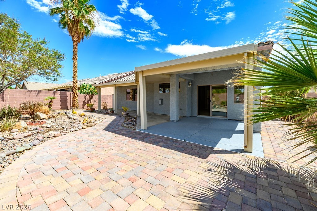 3591 Driving Range Street Las Vegas, NV 89122 - Photo 33 of 79 This desert oasis features a covered patio and beautiful paved walkways.