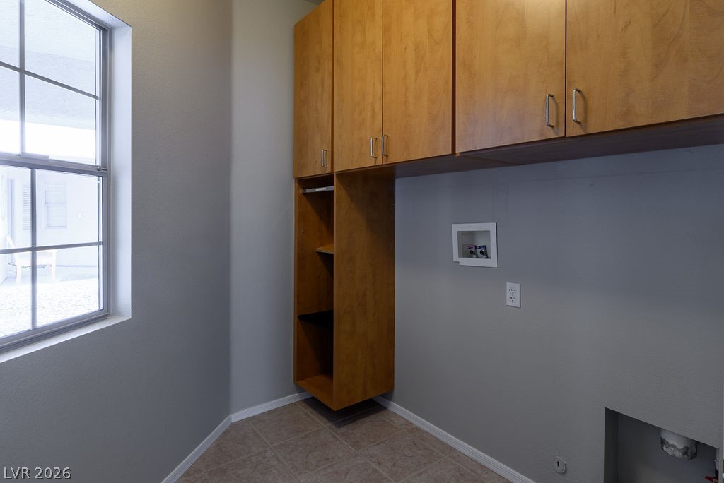 3591 Driving Range Street Las Vegas, NV 89122 - Photo 54 of 79 This dedicated utility space offers convenient storage and laundry hookups.
