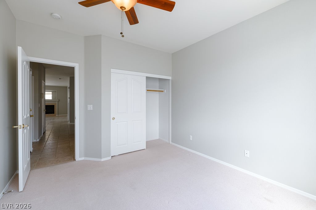 3591 Driving Range Street Las Vegas, NV 89122 - Photo 56 of 79 This spacious bedroom offers ample natural light and a neutral palette, ideal for personalization.