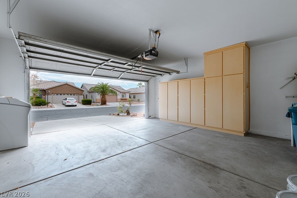 3591 Driving Range Street Las Vegas, NV 89122 - Photo 61 of 79 This spacious garage provides ample storage and convenient direct access.