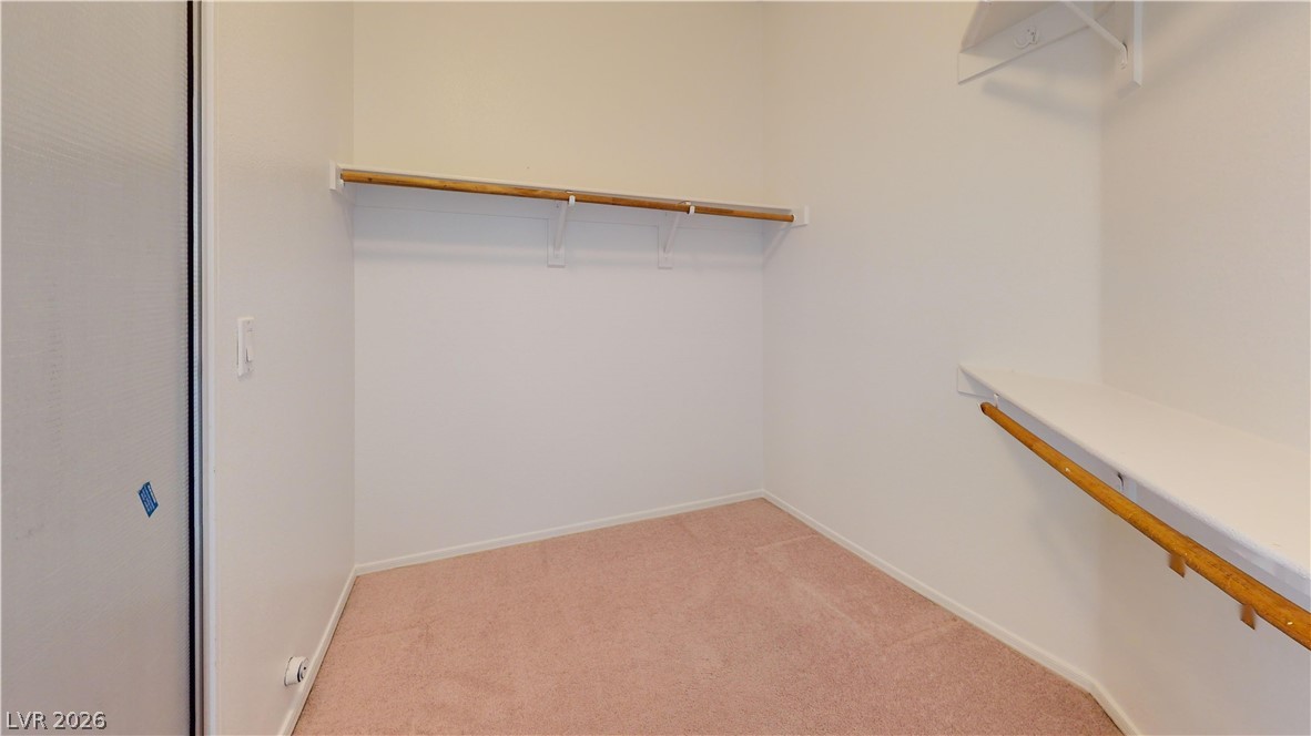3591 Driving Range Street Las Vegas, NV 89122 - Photo 66 of 79 This spacious walk-in closet offers ample storage and organizational potential.