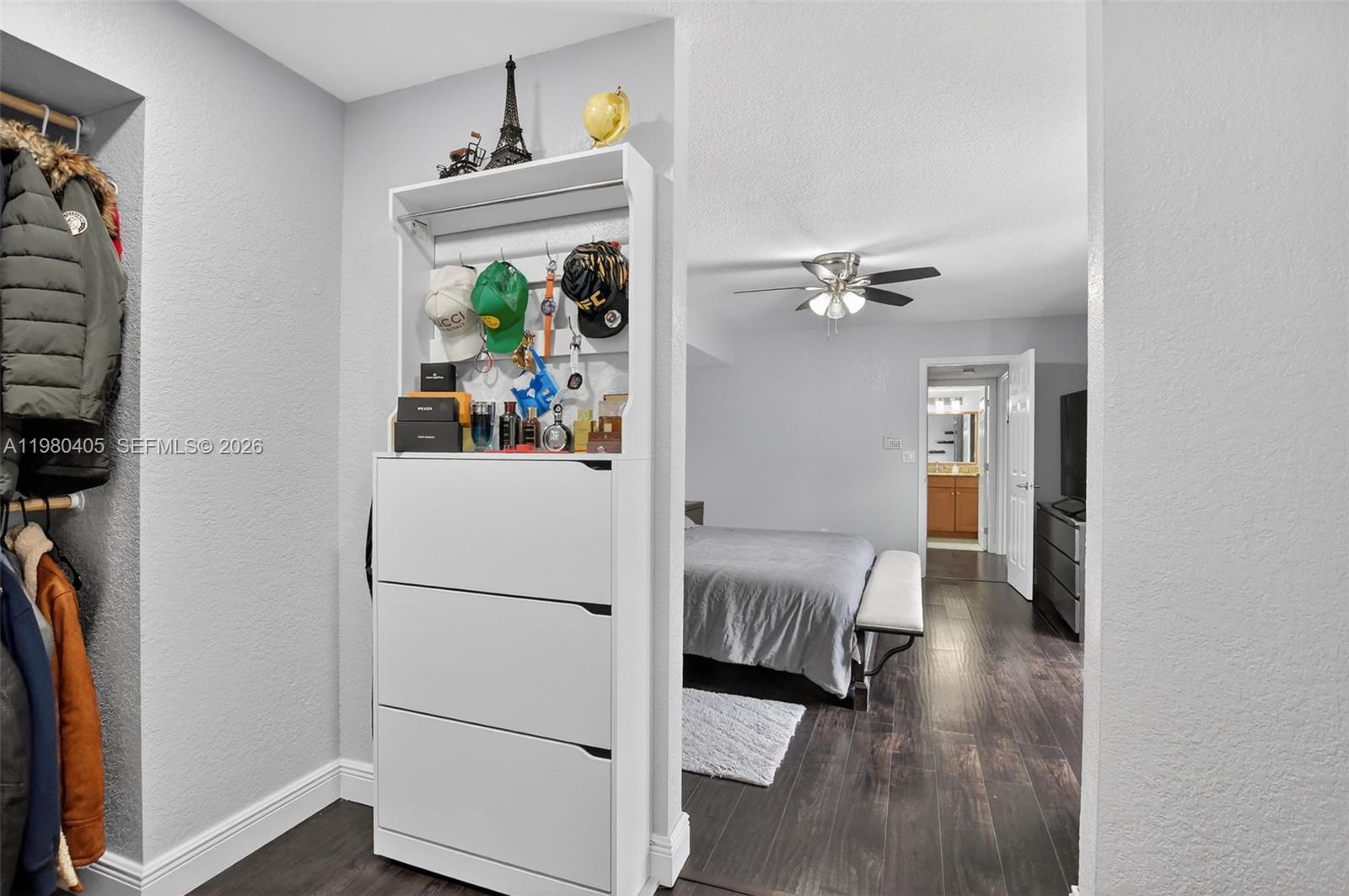 8181 Boca Rio Drive, Unit 8181 Boca Raton, FL 33433 - Photo 26 of 40 a view of a hallway with workspace and a window