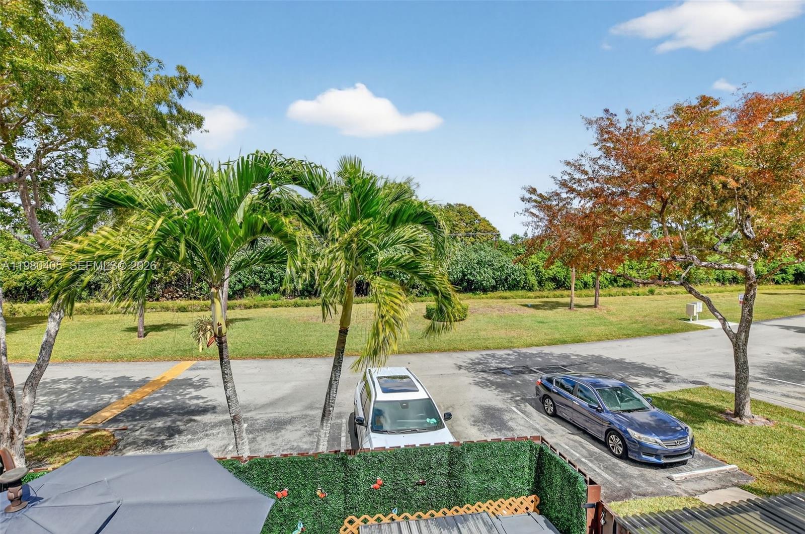 8181 Boca Rio Drive, Unit 8181 Boca Raton, FL 33433 - Photo 32 of 40 a view of a yard with an outdoor space