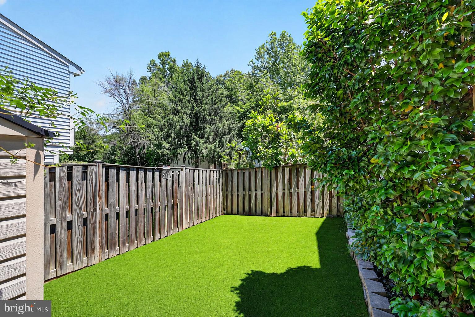 8471 Great Lake Lane Springfield, VA 22153 - Photo 41 of 65 a view of a deck with a backyard