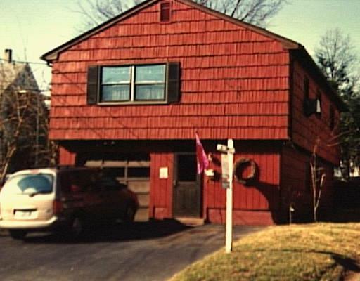 210 Jennings Road Fairfield, CT 06825 - Photo 1 of 1 a front view of a house with garden