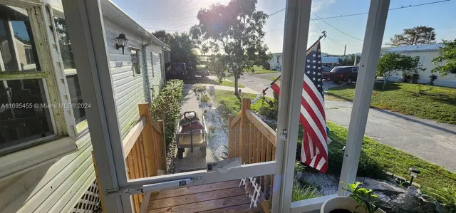 a view of swimming pool from a balcony