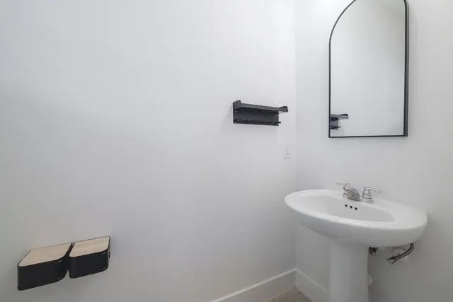 a kitchen with a stove and a refrigerator