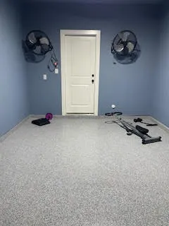 a view of a room with wooden shelves