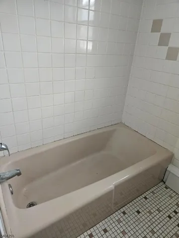 a bathroom with a bathtub