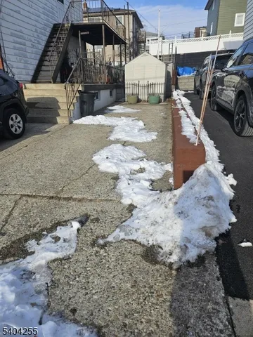 a view of a street with cars