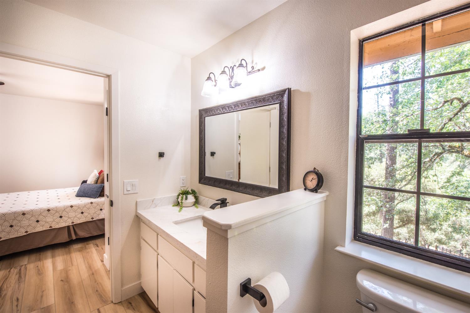 15046 Leiter Way Grass Valley, CA 95949 - Photo 13 of 43 a room with a bed and a mirror