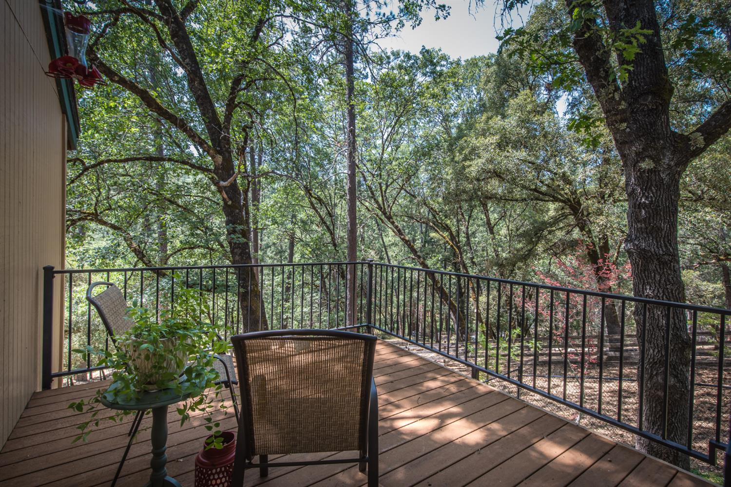 15046 Leiter Way Grass Valley, CA 95949 - Photo 33 of 43 a view of balcony with wooden floor and fence