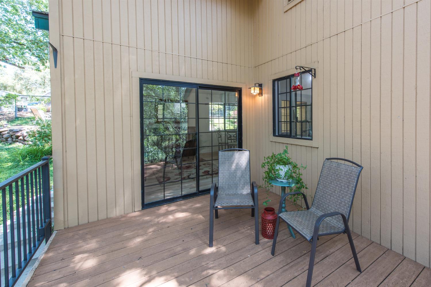 15046 Leiter Way Grass Valley, CA 95949 - Photo 34 of 43 a view of a house with a chairs and table in a patio