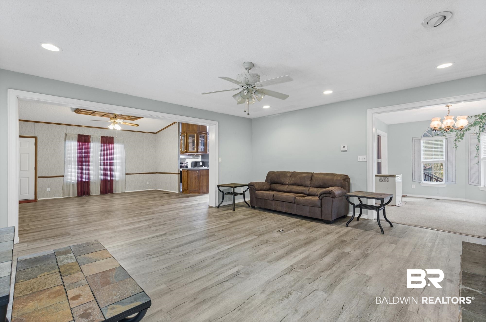 8675 Hunters Pointe Drive North Theodore, AL 36582 - Photo 8 of 20 Spacious living area featuring wood-finish flooring, recessed lighting, and a ceiling fan