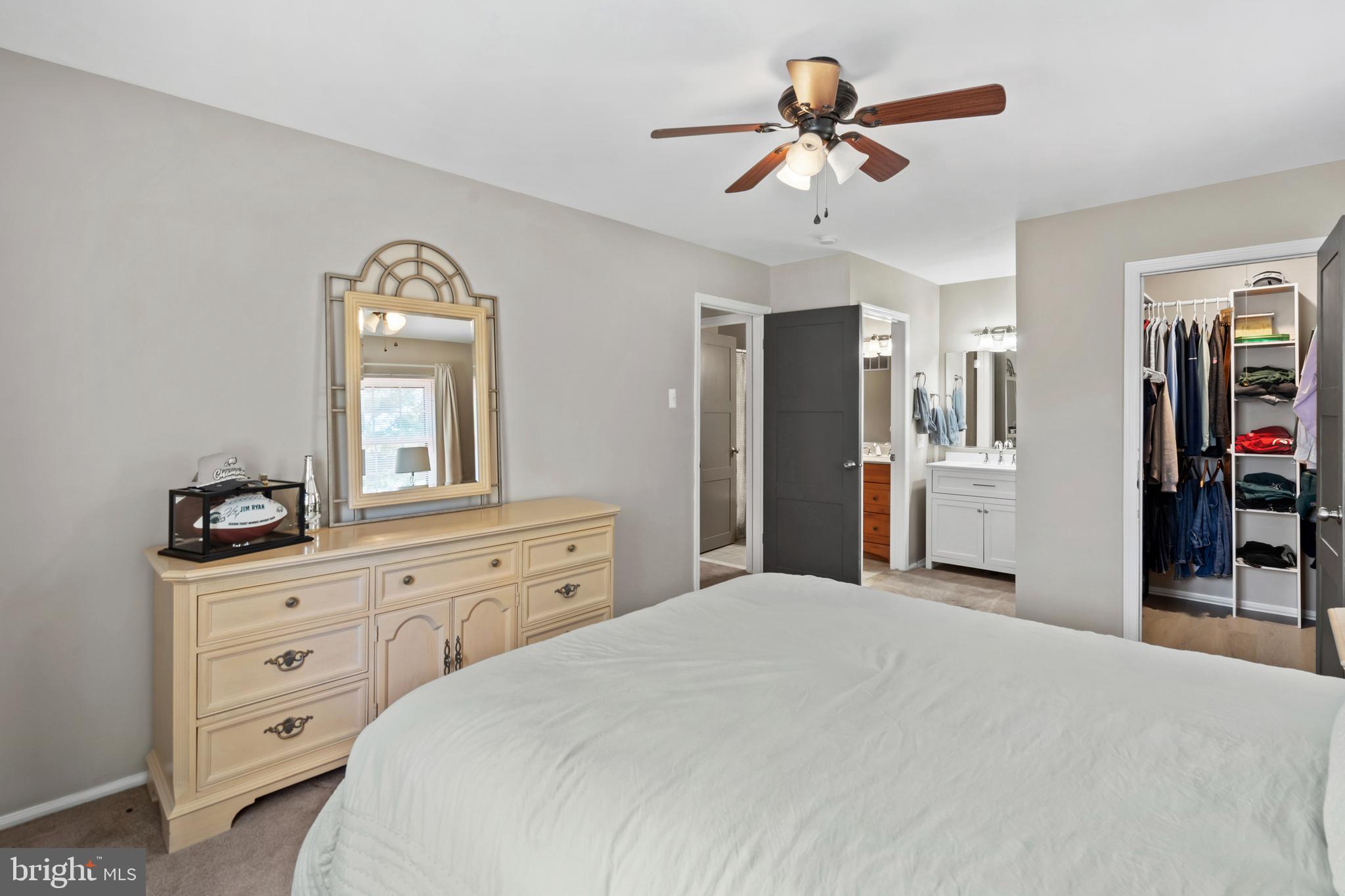 110 Rutledge Court North Wales, PA 19454 - Photo 14 of 35 a bedroom with a bed and a chandelier