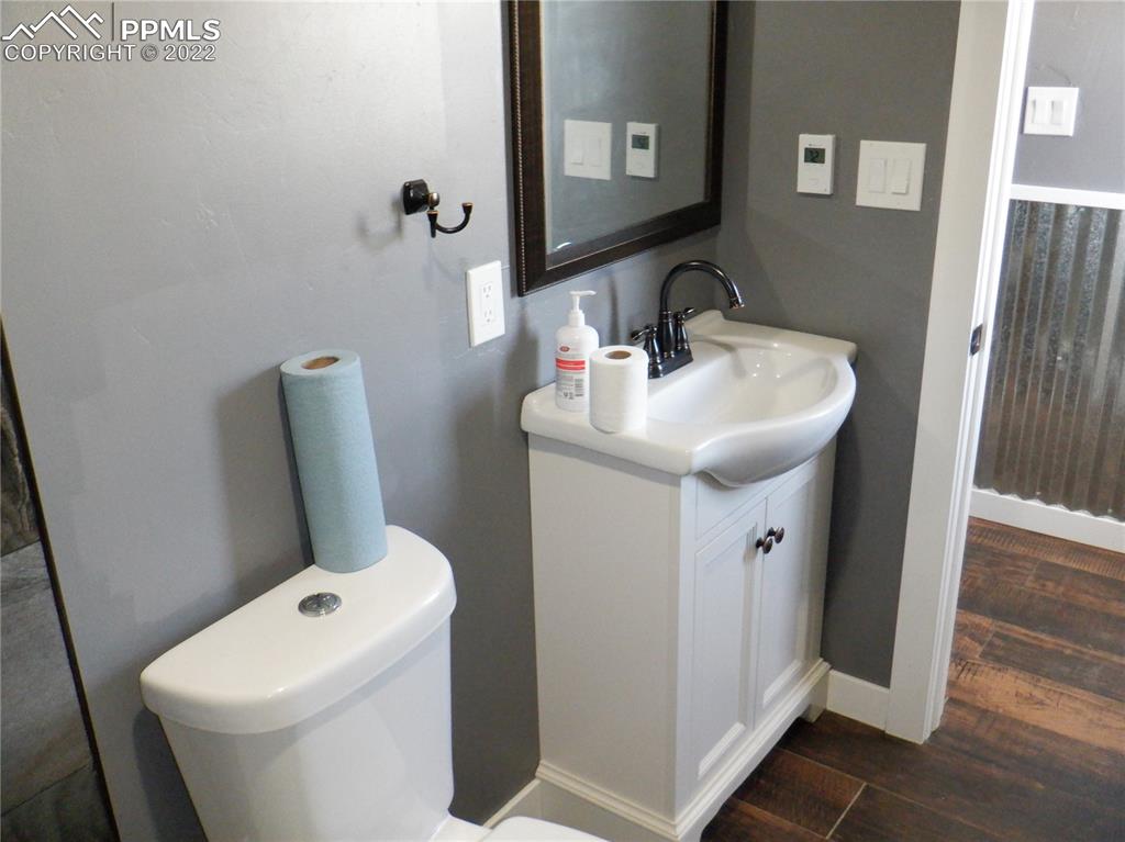 995 Choate Lane Yoder, CO 80864 - Photo 20 of 48 a bathroom with a sink toilet and shower
