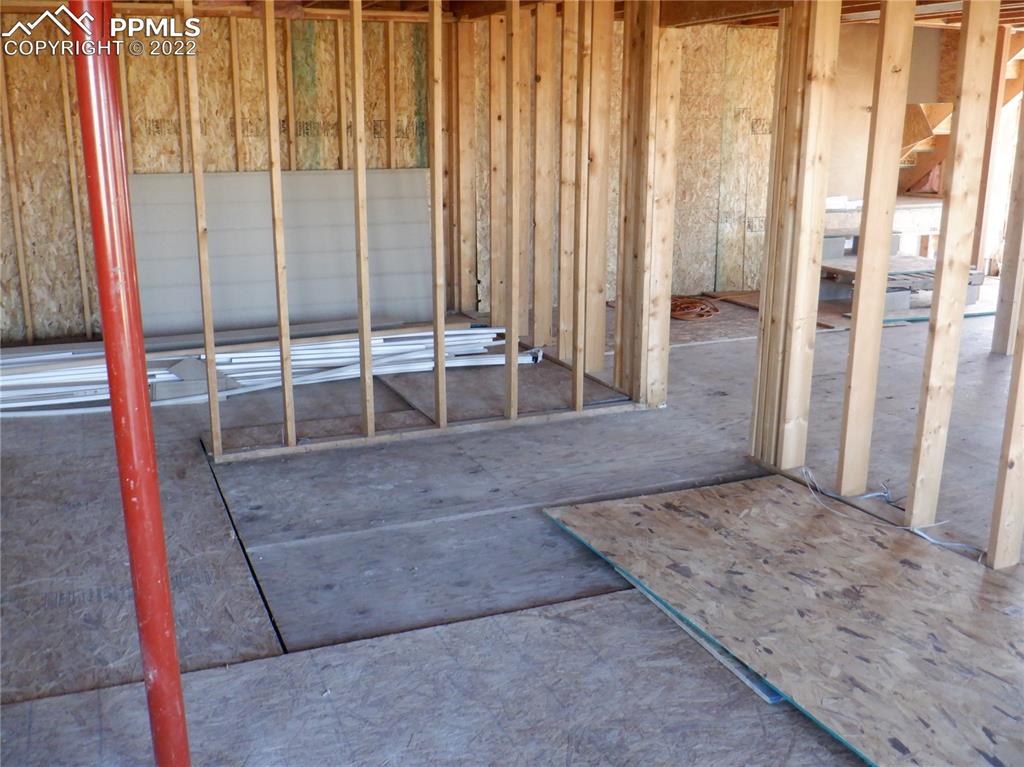 995 Choate Lane Yoder, CO 80864 - Photo 25 of 48 a view of an empty room with floor