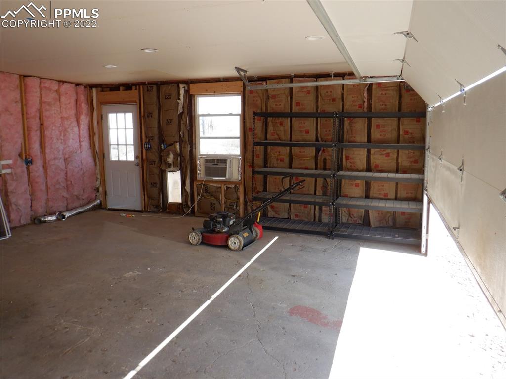 995 Choate Lane Yoder, CO 80864 - Photo 27 of 48 a view of a garage