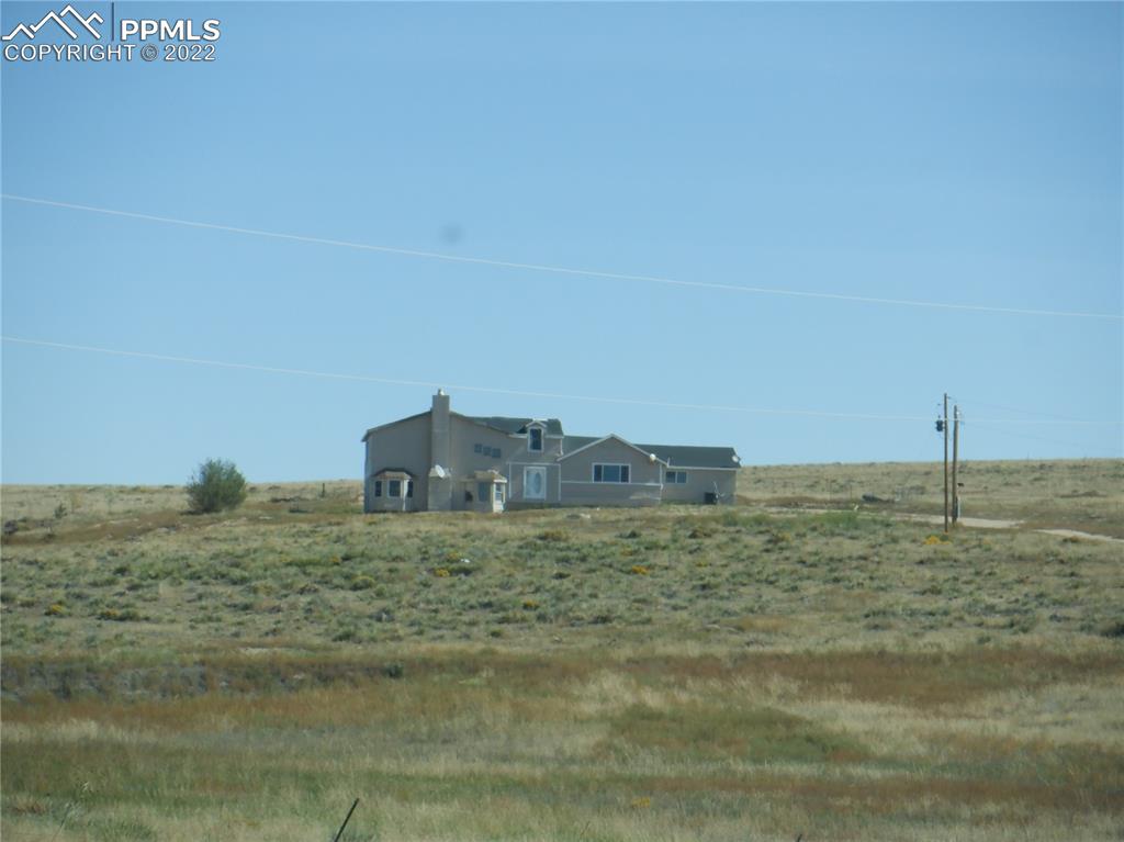 995 Choate Lane Yoder, CO 80864 - Photo 5 of 48 a view of ocean view with beach