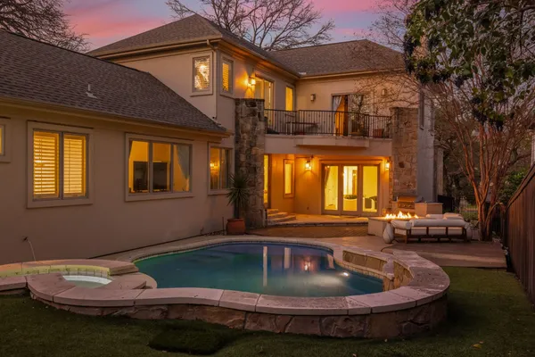 a view of a house with swimming pool