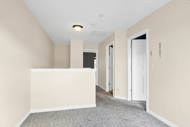 a view of a room with a hallway