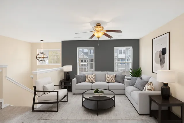 a living room with furniture and a couch