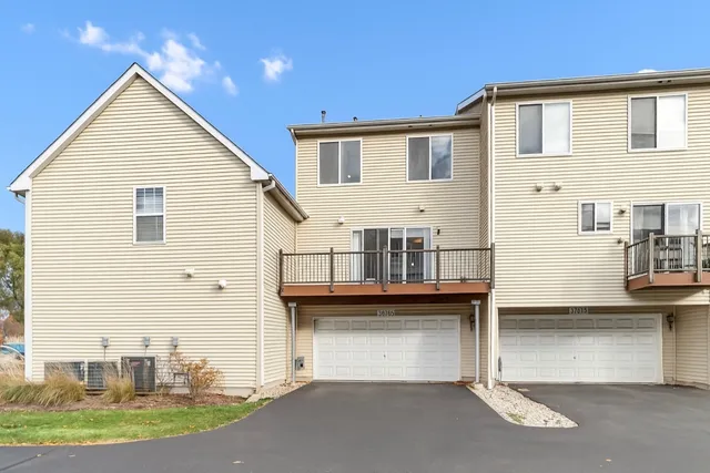 a view of road with large trees