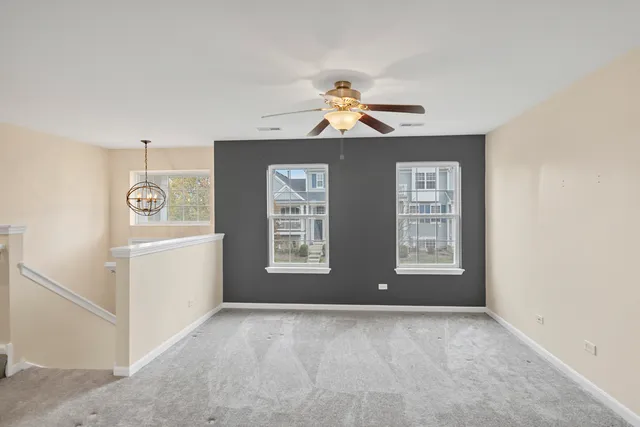 a view of a kitchen with a stove cabinets and a window