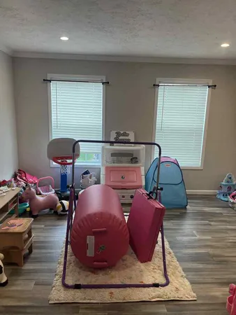 a room with furniture and a wooden floor