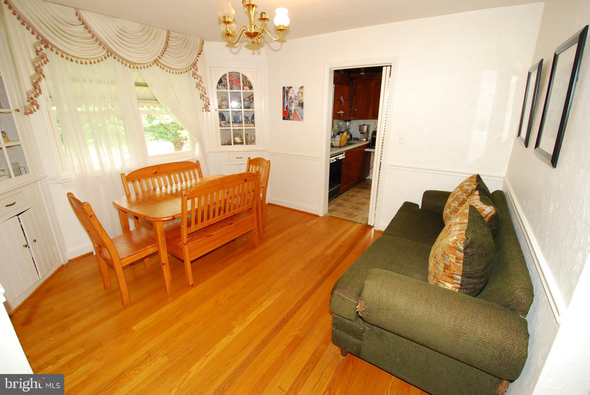 26609 Ridge Road Damascus, MD 20872 - Photo 11 of 17 a living room with furniture and a couch