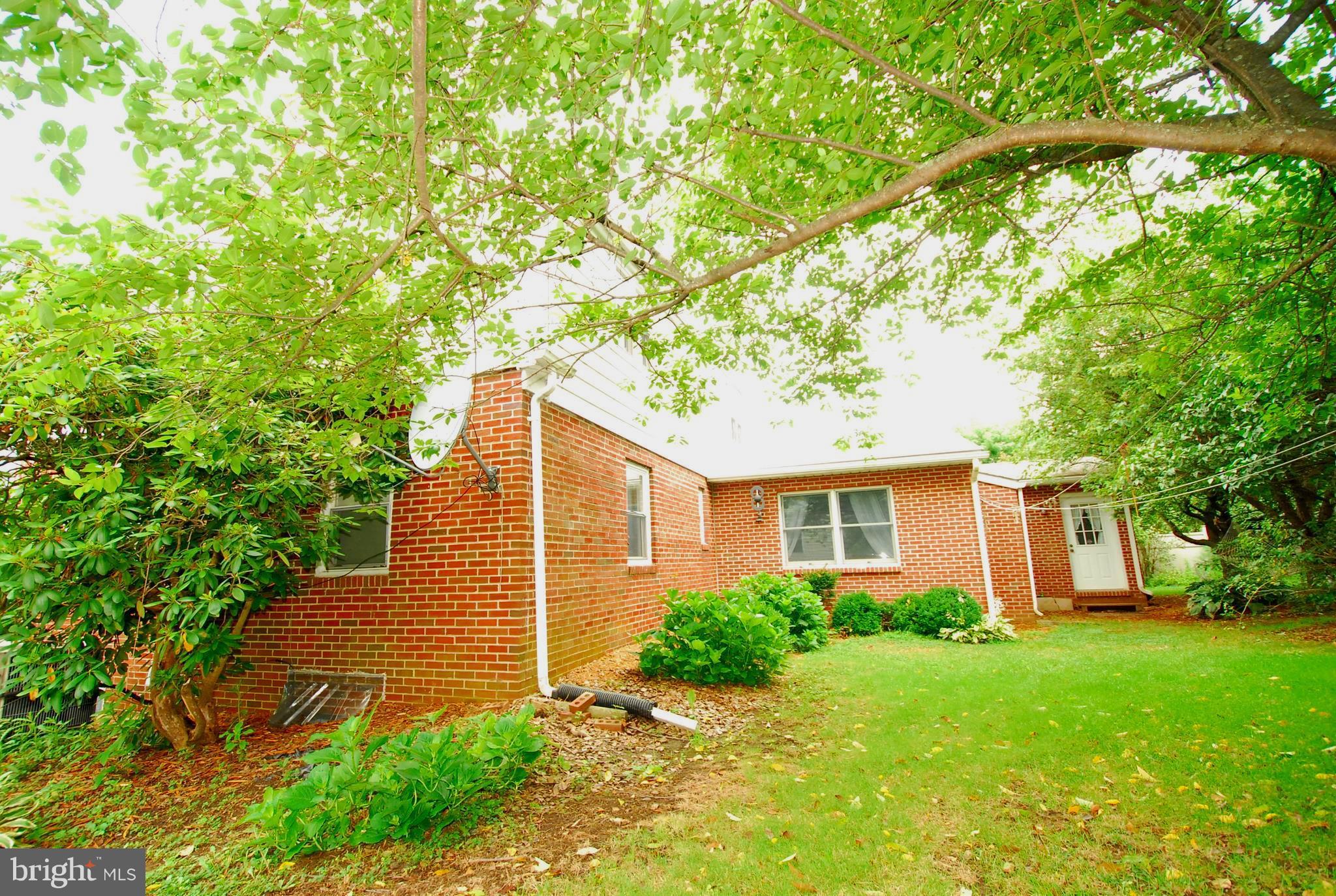 26609 Ridge Road Damascus, MD 20872 - Photo 4 of 17 a view of backyard of house with green space