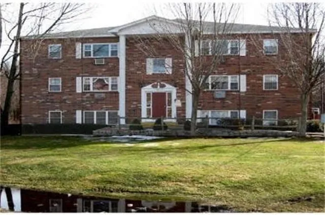 a view of a building with a swimming pool