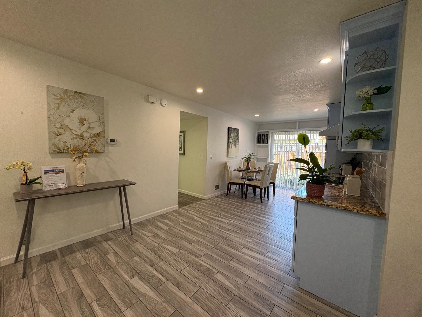 5187 Doyle Road San Jose, CA 95129 - Photo 14 of 39 a living room with furniture and wooden floor