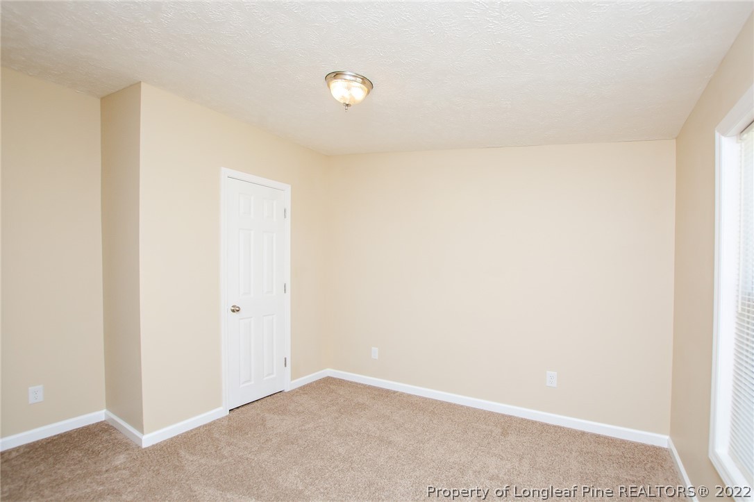 246 Loop Road Raeford, NC 28376 - Photo 26 of 42 a view of an empty room