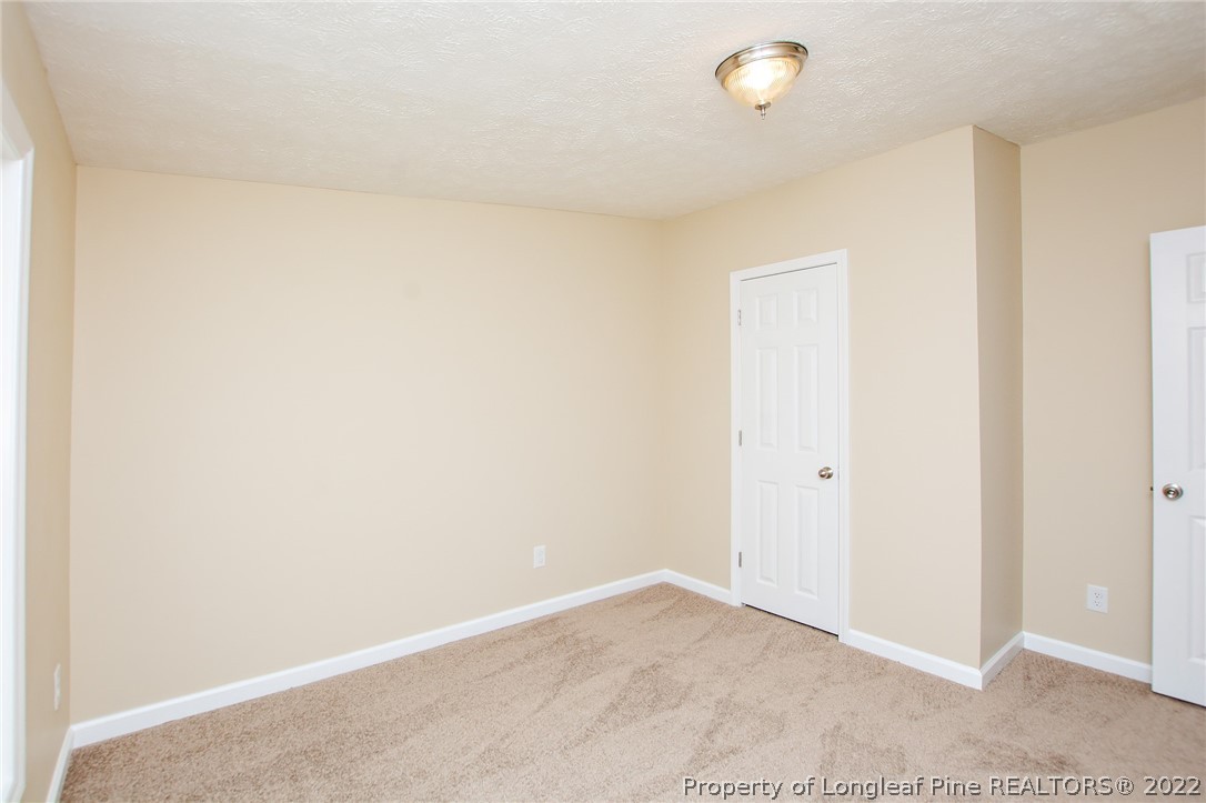 246 Loop Road Raeford, NC 28376 - Photo 27 of 42 a view of an empty room