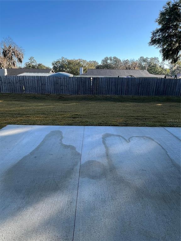 55 Northwest 45th Loop Ocala, FL 34475 - Photo 17 of 20 a view of a yard