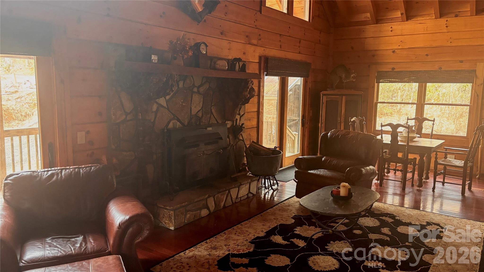 1694 Humpback Mountain Road Spruce Pine, NC 28777 - Photo 5 of 9 a living room with furniture and a window