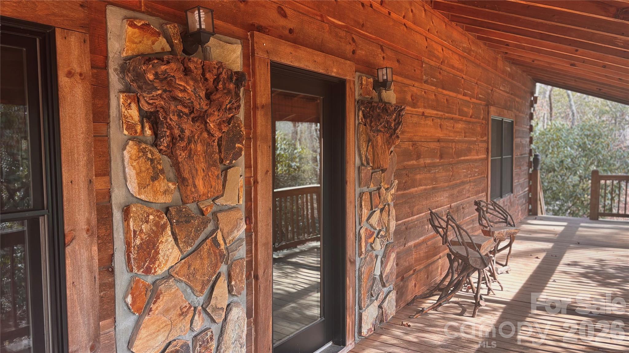 1694 Humpback Mountain Road Spruce Pine, NC 28777 - Photo 7 of 9 a view of a door and an outdoor space
