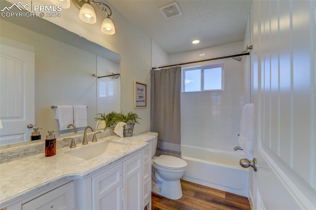 430 Miners Road Canon City, CO 81212 - Photo 39 of 50 a bathroom with a granite countertop sink toilet and shower