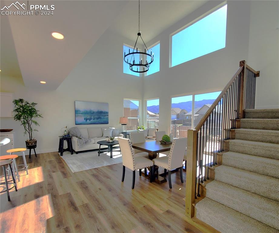 430 Miners Road Canon City, CO 81212 - Photo 6 of 50 a view of a dining room with furniture window and wooden floor