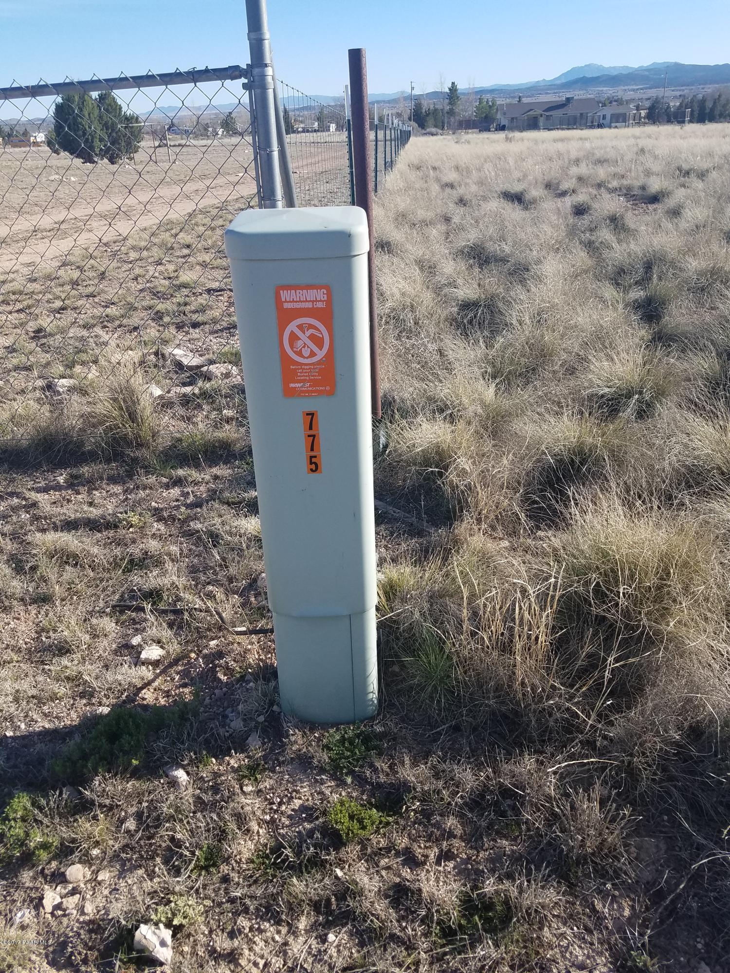 775 West Ahonen Road Paulden, AZ 86334 - Photo 8 of 8 a sign that is on the side of a road