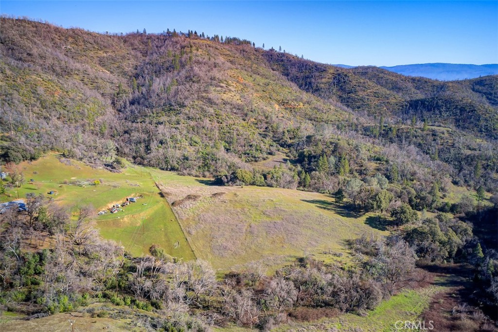 0 Big Ridge Road Berry Creek, CA 95916 - Photo 4 of 17 a view of a field with a mountain in the background