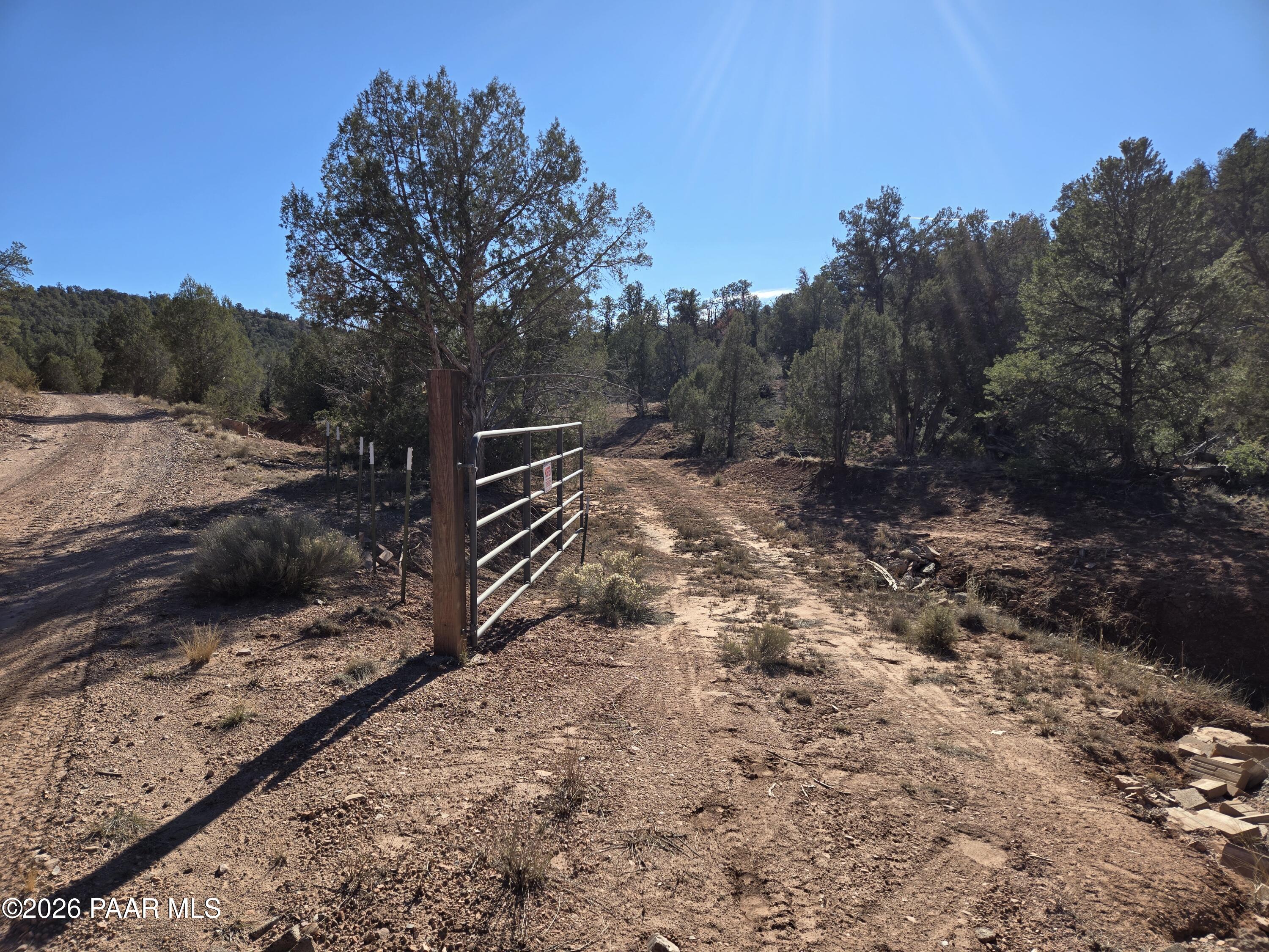 138 Arizona Road Ash Fork, AZ 86320 - Photo 18 of 21 a view of a yard with wooden fence