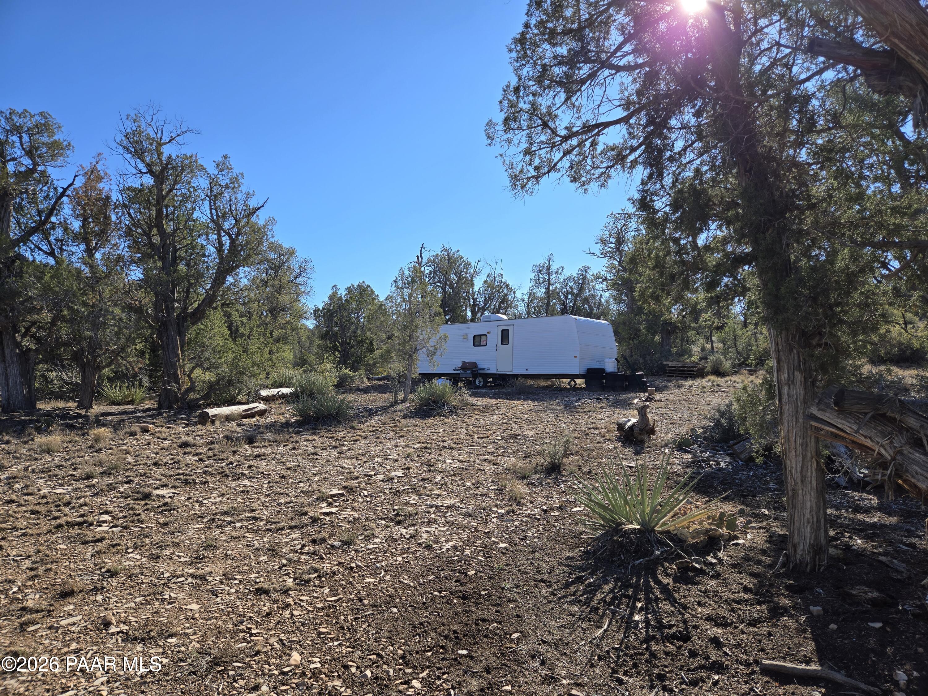 138 Arizona Road Ash Fork, AZ 86320 - Photo 2 of 21 a house view with a backyard space