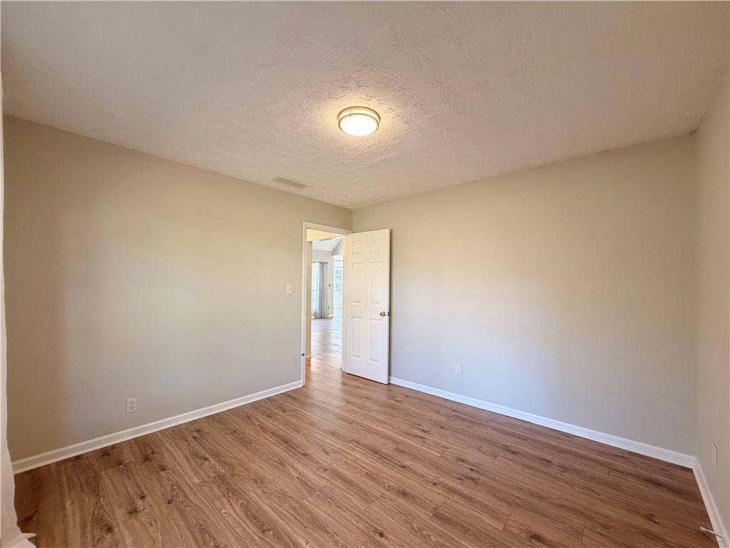 2575 Hamilton Parc Lane Northeast Buford, GA 30519 - Photo 22 of 63 a view of an empty room