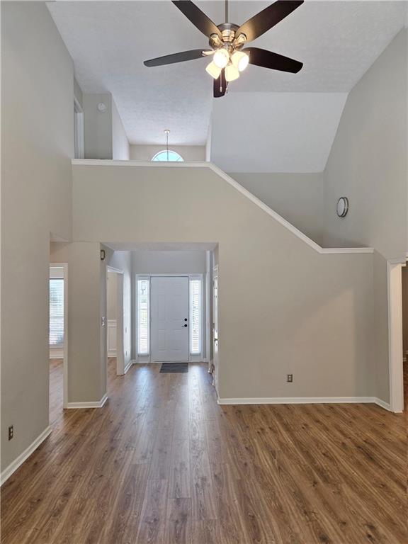 2575 Hamilton Parc Lane Northeast Buford, GA 30519 - Photo 33 of 63 a view of an empty room with window and wooden floor