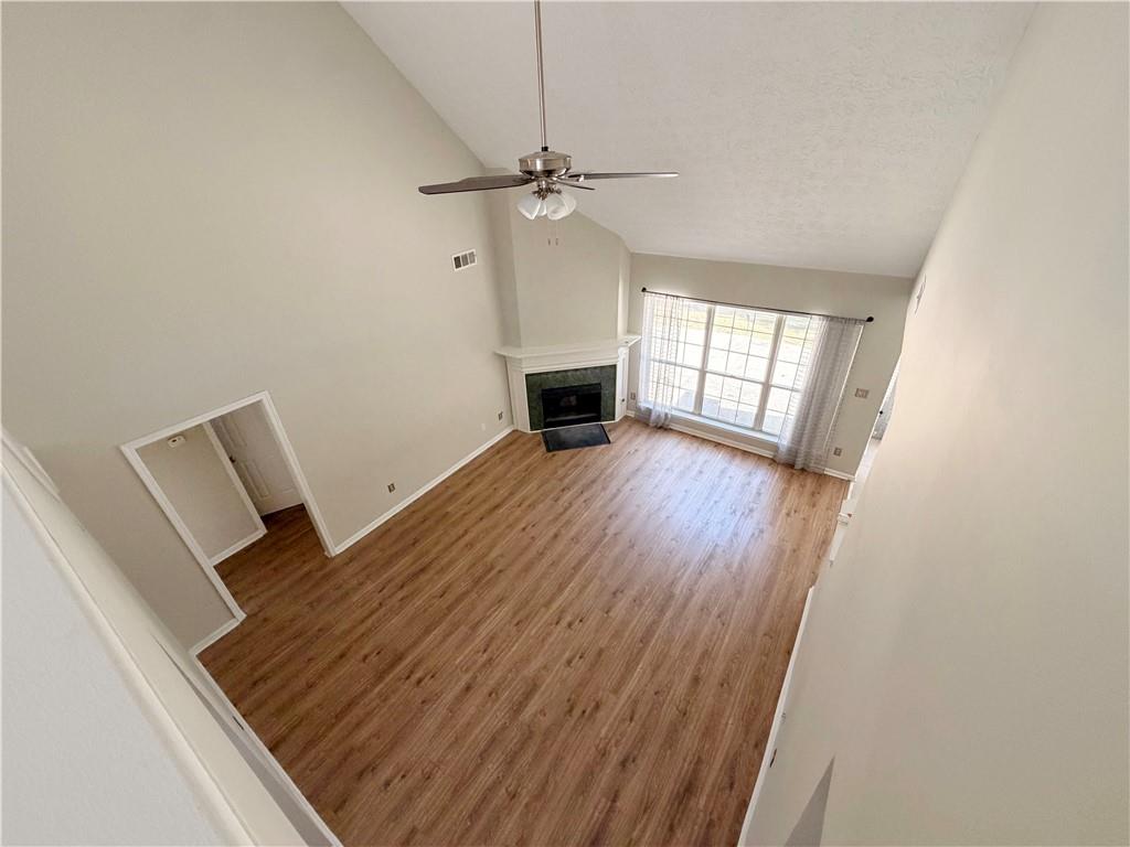 2575 Hamilton Parc Lane Northeast Buford, GA 30519 - Photo 39 of 63 wooden floor in an empty room with a window