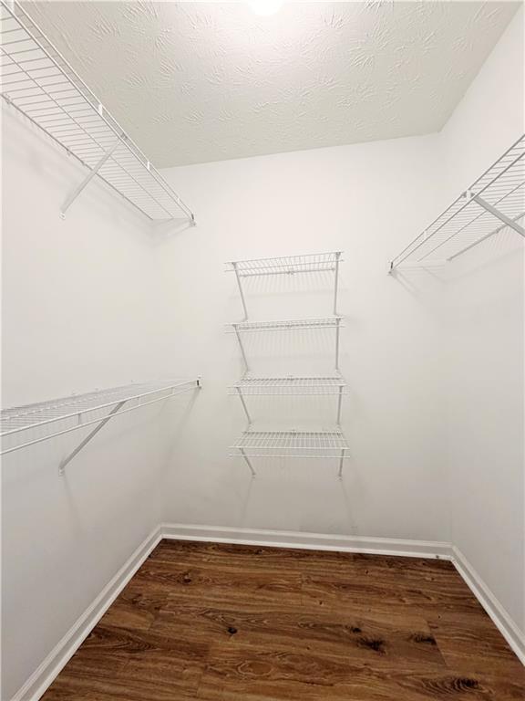 2575 Hamilton Parc Lane Northeast Buford, GA 30519 - Photo 45 of 63 a view of a room with racks on the wall