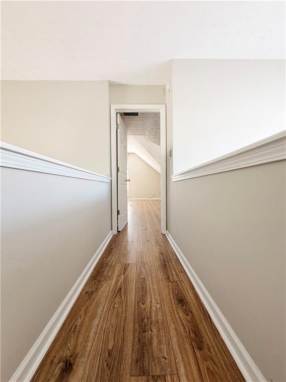 2575 Hamilton Parc Lane Northeast Buford, GA 30519 - Photo 51 of 63 a view of a room with wooden floor